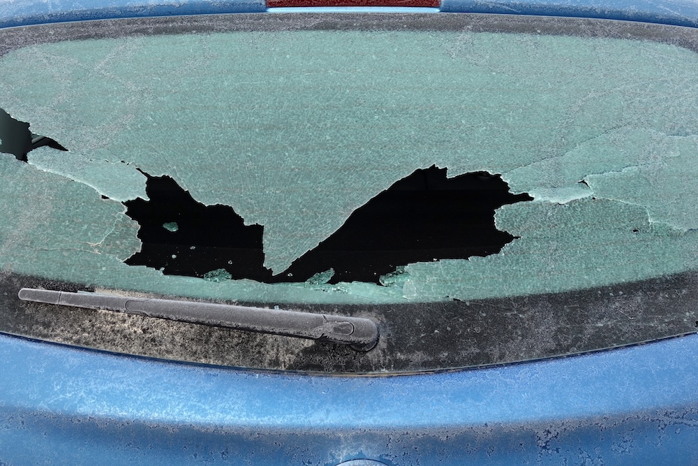 broken rear window on car in winter time broken rear window on car in winter time